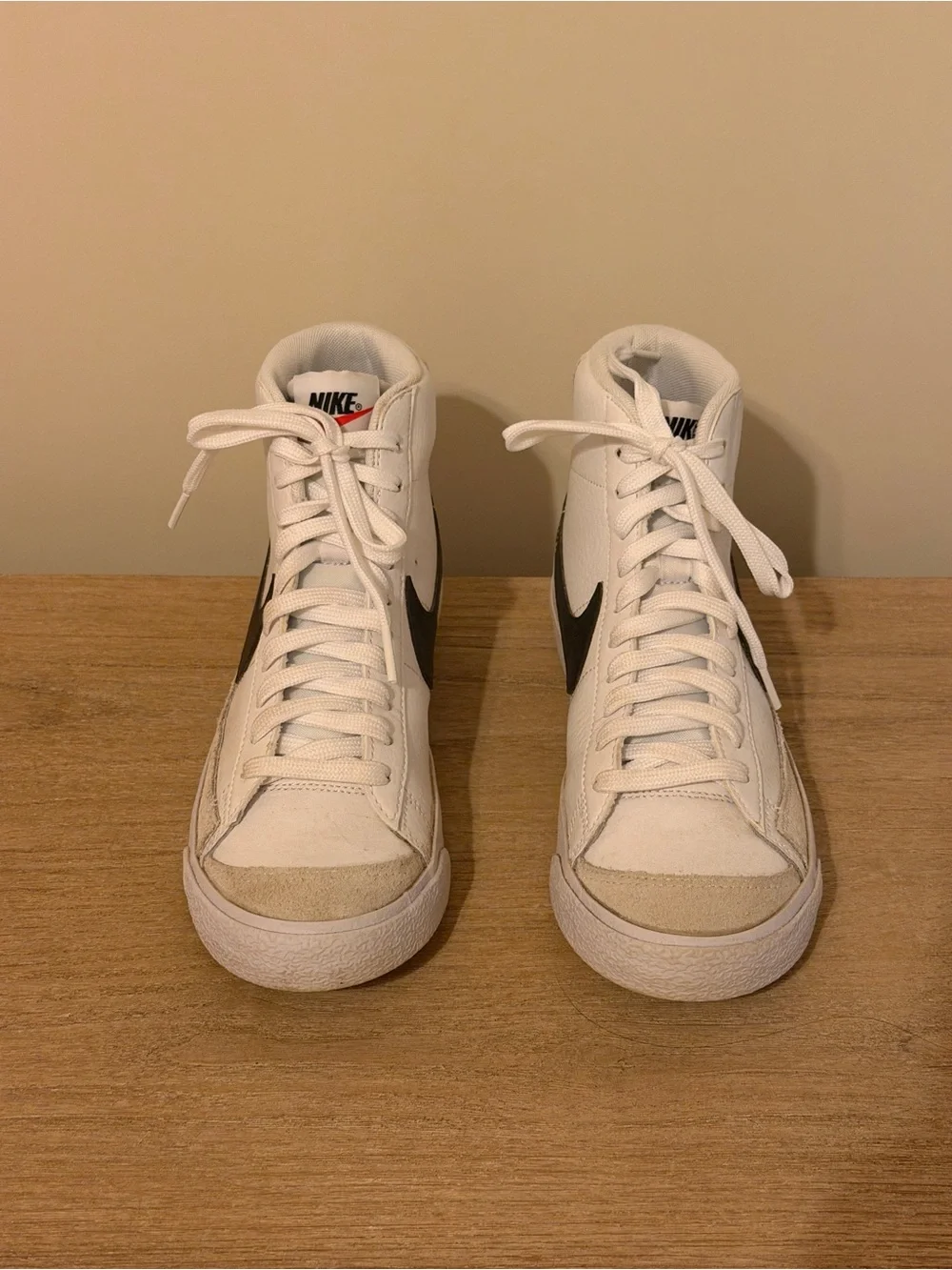 Nike White High-Top Sneakers with Black Swoosh Accent